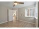 Spacious bedroom with hardwood floors and access to other rooms at 8608 Millsboro Dr, Las Vegas, NV 89134