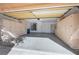 Two-car garage with built-in storage cabinets at 8608 Millsboro Dr, Las Vegas, NV 89134