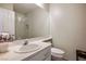 Clean bathroom with a single sink vanity and shower/tub combo at 8896 Dove Cove Dr, Las Vegas, NV 89129