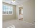 Spacious bedroom with en-suite bathroom and carpet flooring at 8896 Dove Cove Dr, Las Vegas, NV 89129