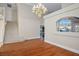 Formal dining room with hardwood floors and a chandelier at 8896 Dove Cove Dr, Las Vegas, NV 89129