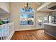 Bright dining room with hardwood floors and chandelier at 8896 Dove Cove Dr, Las Vegas, NV 89129