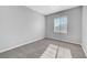 Bright bedroom with carpet flooring and neutral walls at 9104 Little Horse Ave, Las Vegas, NV 89143