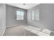 Well-lit bedroom with neutral walls and carpet flooring at 9104 Little Horse Ave, Las Vegas, NV 89143