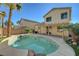 Charming backyard oasis with kidney-shaped pool at 9104 Little Horse Ave, Las Vegas, NV 89143