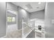 Upstairs hallway with view of bedroom and kitchen at 9104 Little Horse Ave, Las Vegas, NV 89143