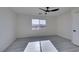 Bright and airy bedroom with a ceiling fan and window at 9279 Cabin Cove Ave, Las Vegas, NV 89148