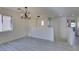 Open concept dining area with hardwood floors and elegant chandelier at 9279 Cabin Cove Ave, Las Vegas, NV 89148