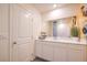 Clean bathroom with white vanity and mirror at 9315 Jade Mesa St # Lot 62, Las Vegas, NV 89139