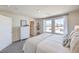 Main bedroom with king-size bed, dresser, and en-suite bathroom at 9315 Jade Mesa St # Lot 62, Las Vegas, NV 89139