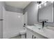 Modern bathroom with white subway tile and glass sink at 936 Boulder Mesa Dr # 201, Las Vegas, NV 89128