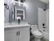 Updated bathroom with glass vessel sink, white vanity, and bathtub at 936 Boulder Mesa Dr # 201, Las Vegas, NV 89128