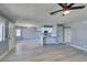 Bright living room with fireplace and wood-look floors at 936 Boulder Mesa Dr # 201, Las Vegas, NV 89128