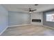 Living room featuring a modern fireplace and ceiling fan at 936 Boulder Mesa Dr # 201, Las Vegas, NV 89128