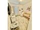 Cozy Bedroom with natural light, plush carpeting, and baby furniture at 965 Nevada State Dr # 1202, Henderson, NV 89002