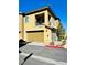 Modern two-story home with a one-car garage and a small balcony at 965 Nevada State Dr # 1202, Henderson, NV 89002