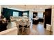 Bright, open-concept living space with modern light fixture and neutral furnishings at 965 Nevada State Dr # 1202, Henderson, NV 89002