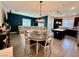 Open-concept living space with a large sectional, dining area, and modern kitchen at 965 Nevada State Dr # 1202, Henderson, NV 89002