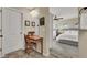 Main bedroom features a vanity area and a view into the bedroom at 9916 Fallowdeer Ct, Las Vegas, NV 89149