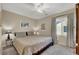 Spacious bedroom with king-size bed and plenty of natural light at 9916 Fallowdeer Ct, Las Vegas, NV 89149