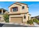 Beautiful two-story home with attached garage and landscaping at 9916 Fallowdeer Ct, Las Vegas, NV 89149