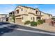 Two-story home with attached garage and landscaping at 9916 Fallowdeer Ct, Las Vegas, NV 89149