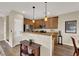 Modern kitchen with stainless steel appliances and island at 9916 Fallowdeer Ct, Las Vegas, NV 89149