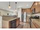 Modern kitchen with stainless steel appliances and island at 9916 Fallowdeer Ct, Las Vegas, NV 89149