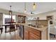 Modern kitchen with stainless steel appliances and island at 9916 Fallowdeer Ct, Las Vegas, NV 89149