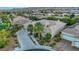 Single-Gathering home with a tile roof and solar panels in a residential neighborhood at 10275 Tresor Ct, Las Vegas, NV 89135