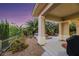 Covered patio with hot tub and barbecue area, perfect for outdoor living at 10275 Tresor Ct, Las Vegas, NV 89135