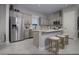 Modern kitchen with island, stainless steel appliances, and gray cabinets at 10929 Sage View Ave # Lot 205, Las Vegas, NV 89166