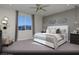 Relaxing primary bedroom with plush bedding and mountain views at 10937 Cilantro Ave # Lot 102, Las Vegas, NV 89166