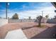 Spacious backyard with gravel and a shed at 1208 Clairemont St, Las Vegas, NV 89110