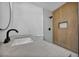 Stylish bathroom with wood-look shower wall and floating vanity at 1208 Clairemont St, Las Vegas, NV 89110