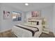 Virtually staged bedroom with a plush bed and stylish decor at 1208 Clairemont St, Las Vegas, NV 89110