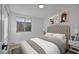 Virtually staged bedroom with a plush bed and decor at 1208 Clairemont St, Las Vegas, NV 89110