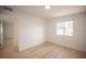 Spacious bedroom with wood-look floors and an open doorway at 1208 Clairemont St, Las Vegas, NV 89110