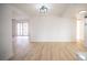 Light and bright dining area with wood-look flooring at 1208 Clairemont St, Las Vegas, NV 89110