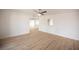 Open concept dining room with wood-look flooring and kitchen view at 1208 Clairemont St, Las Vegas, NV 89110