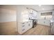 Modern white kitchen with stainless steel appliances at 1208 Clairemont St, Las Vegas, NV 89110