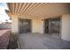 Covered patio with double sliding doors leading inside at 1208 Clairemont St, Las Vegas, NV 89110