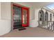 Balcony access with a red door and modern railing at 1610 Hardrock St, Las Vegas, NV 89156