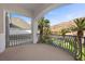 Covered balcony overlooking a landscaped yard and mountain views at 1610 Hardrock St, Las Vegas, NV 89156