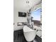 Spa-like bathroom featuring a freestanding tub, fireplace, and scenic view at 1610 Hardrock St, Las Vegas, NV 89156