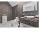 Modern powder room with unique wallcovering and floating vanity at 1610 Hardrock St, Las Vegas, NV 89156