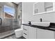 Modern bathroom with a walk-in shower and floating vanity at 1610 Hardrock St, Las Vegas, NV 89156