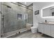 Contemporary bathroom with a large walk-in shower and floating vanity at 1610 Hardrock St, Las Vegas, NV 89156