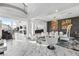 Elegant dining room with white chairs and modern art at 1610 Hardrock St, Las Vegas, NV 89156