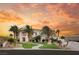 Stunning two-story home with palm trees and landscaped yard at 1610 Hardrock St, Las Vegas, NV 89156